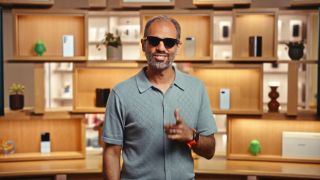 Android president Sameer Samat wearing Google's upcoming smart glasses, as seen on The Android Show I/O Edition 2025