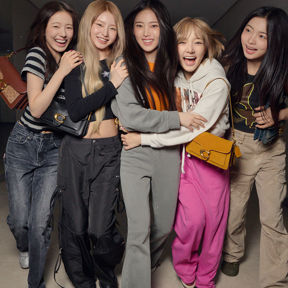 the band KiiiKiii wearing a Coach taby bag and summer outfits