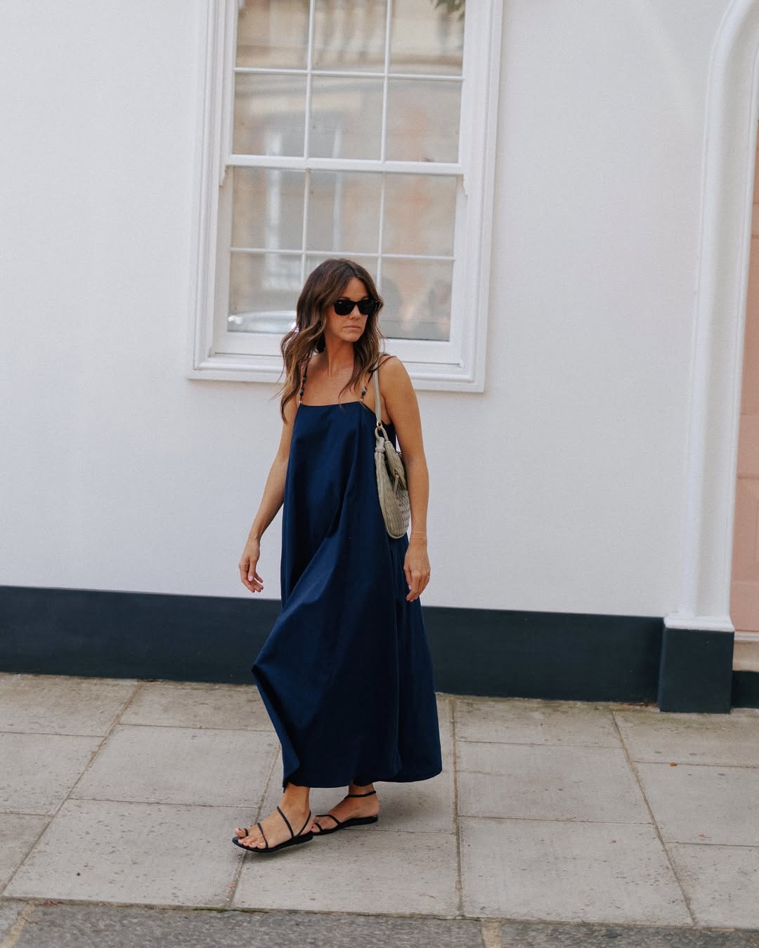 @kimturkington_ wearing sandals and sun dress