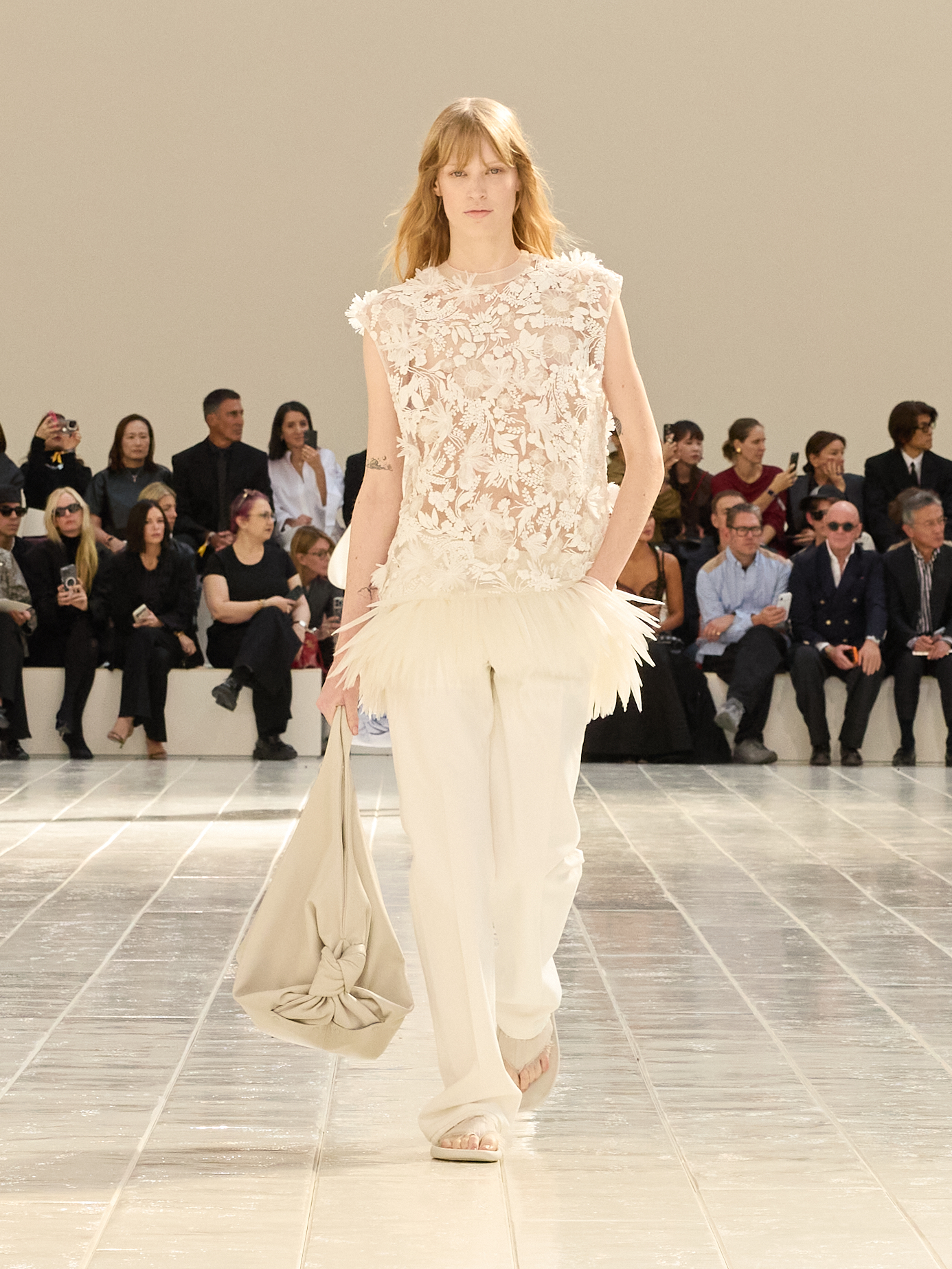 A model walking in the Balenciaga Summer 2027 show during Paris Fashion Week.