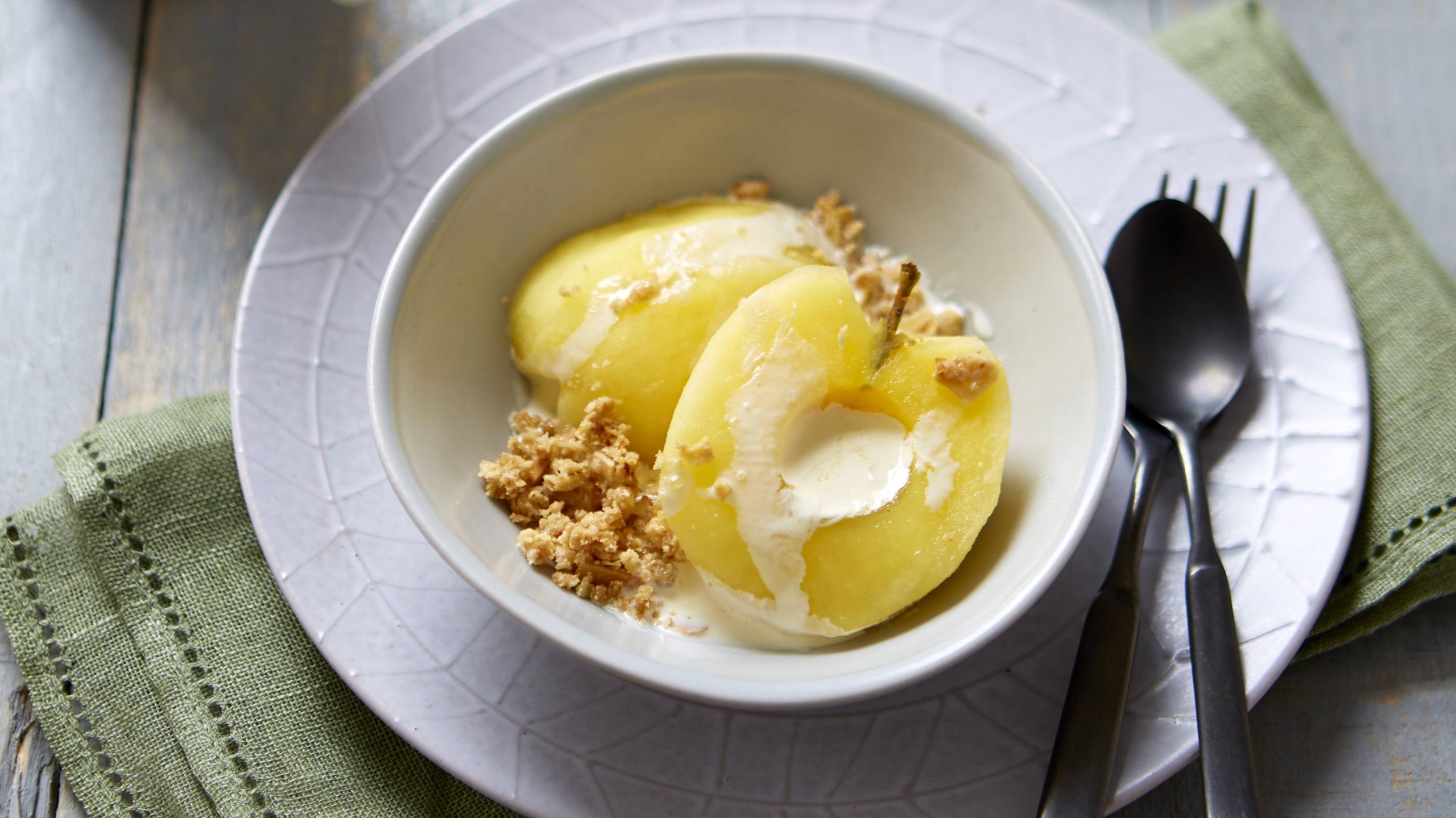 Chardonnay poached apples with crunchy granola