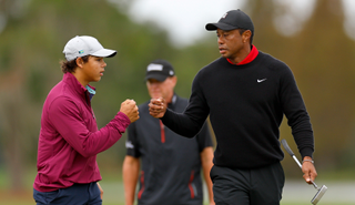 Tiger and Charlie Woods fist pump