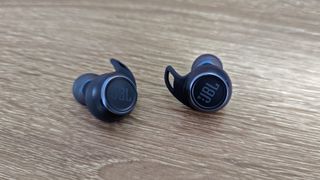 JBL Reflect Aero review: earbuds outside of the charging case