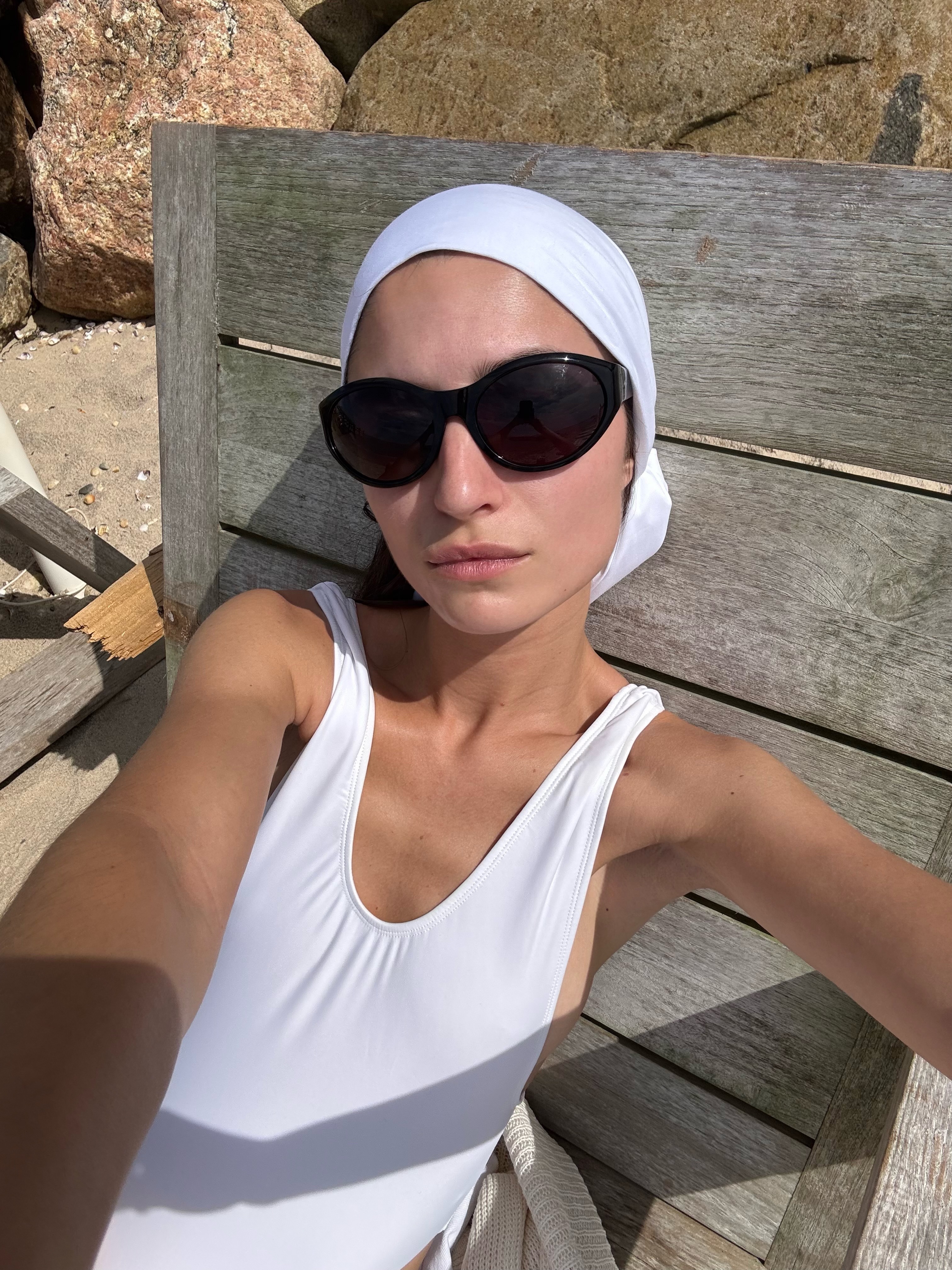 Woman wearing luxury bug-eye sunglasses.