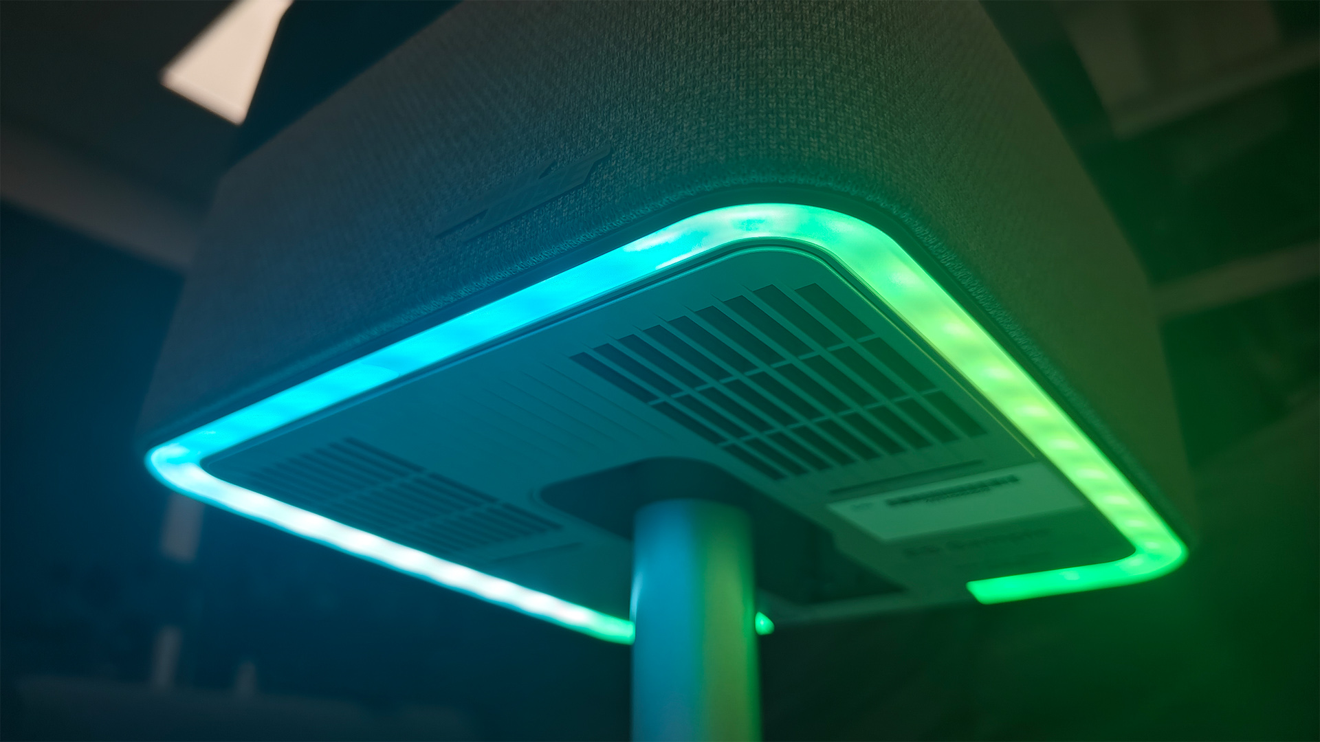 Epson EF-72 home cinema projector detail of underside of unit with green lighting display