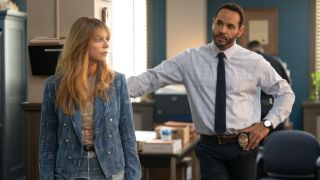 Daniel Sunjata looking at Kaitlin Olson in High Potential.