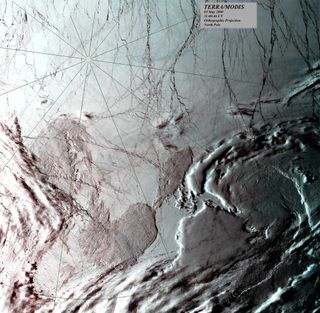 A true-color image taken on May 5, 2000, by an instrument aboard NASA's Terra spacecraft, over the North Pole, with sea ice shown in white and open water in black.