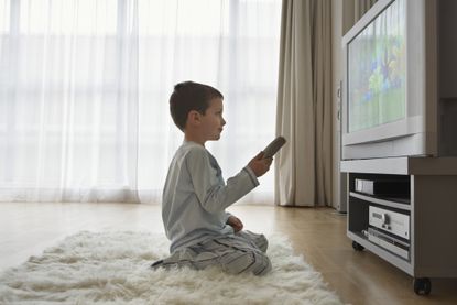 child watching TV