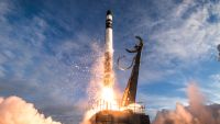 A Rocket Lab Electron booster carrying 13 NASA satellites, including 10 cubesats for agency's Educational Launch of Nanosatellites program, lifts off from the Mahia Peninsula of New Zealand's North Island on Dec. 16, 2018 on the ElaNa-19 mission.