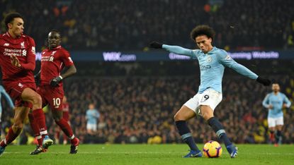 Leroy Sane shoots for Man City against Liverpool