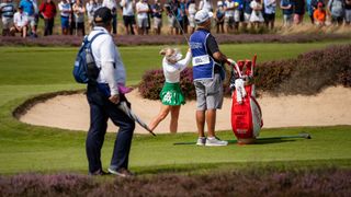 Charley Hull plays a shot out of a bunker during the AIG Women's Open