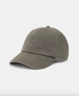 A grey baseball cap in front of a plain background