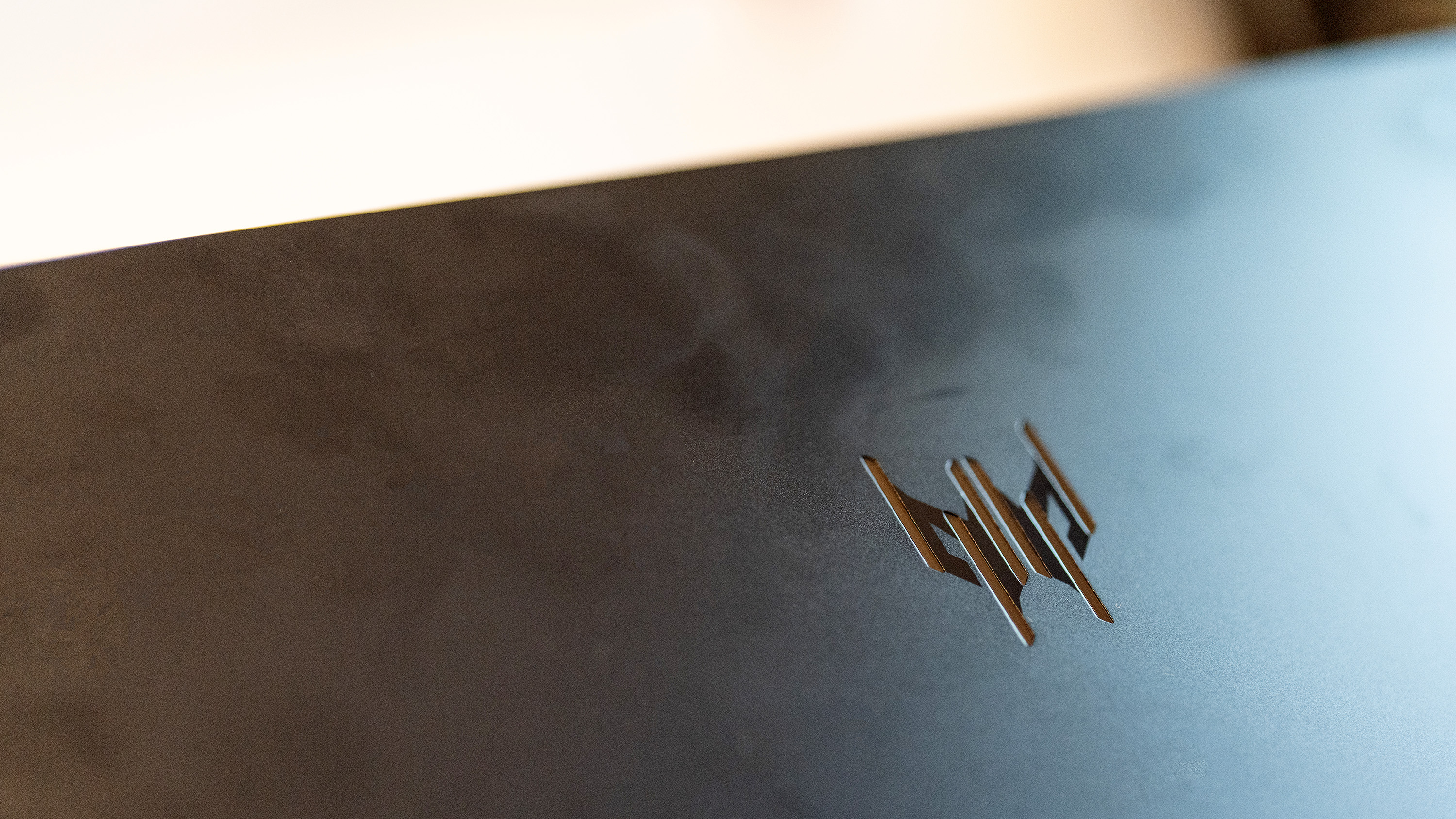 A black Acer Predator Helios Neo 16 gaming laptop on a white table