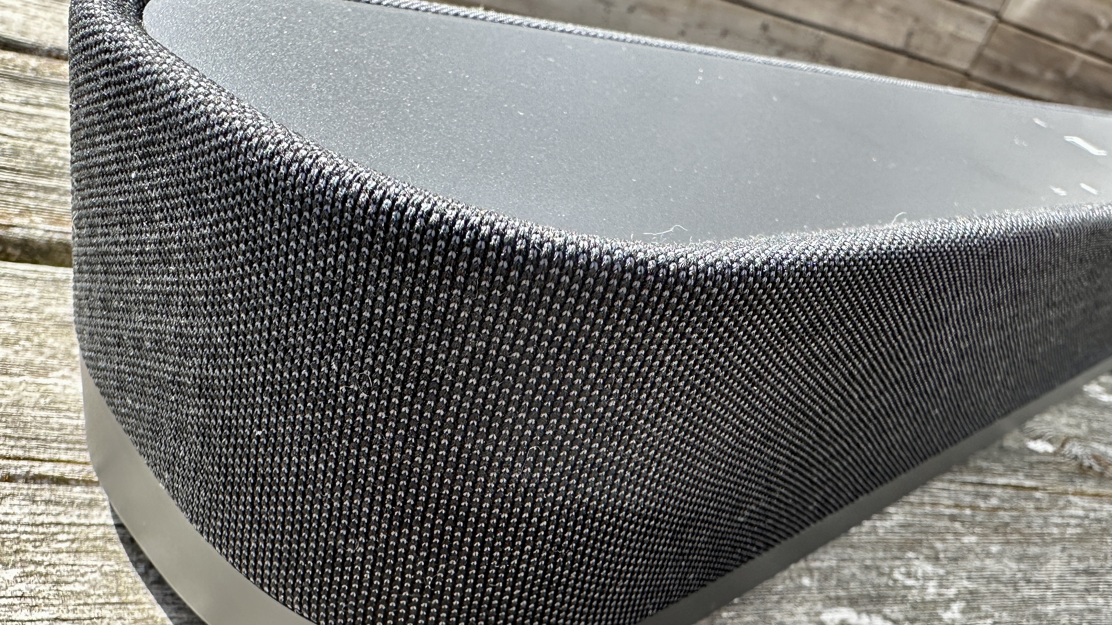 Sennheiser Ambeo Mini speaker grille close-up at the ends