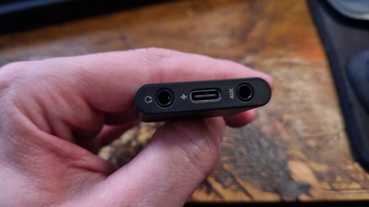 Various shots of the Rig R5 Spear Max HD gaming headset and its included USB Type-C DAC