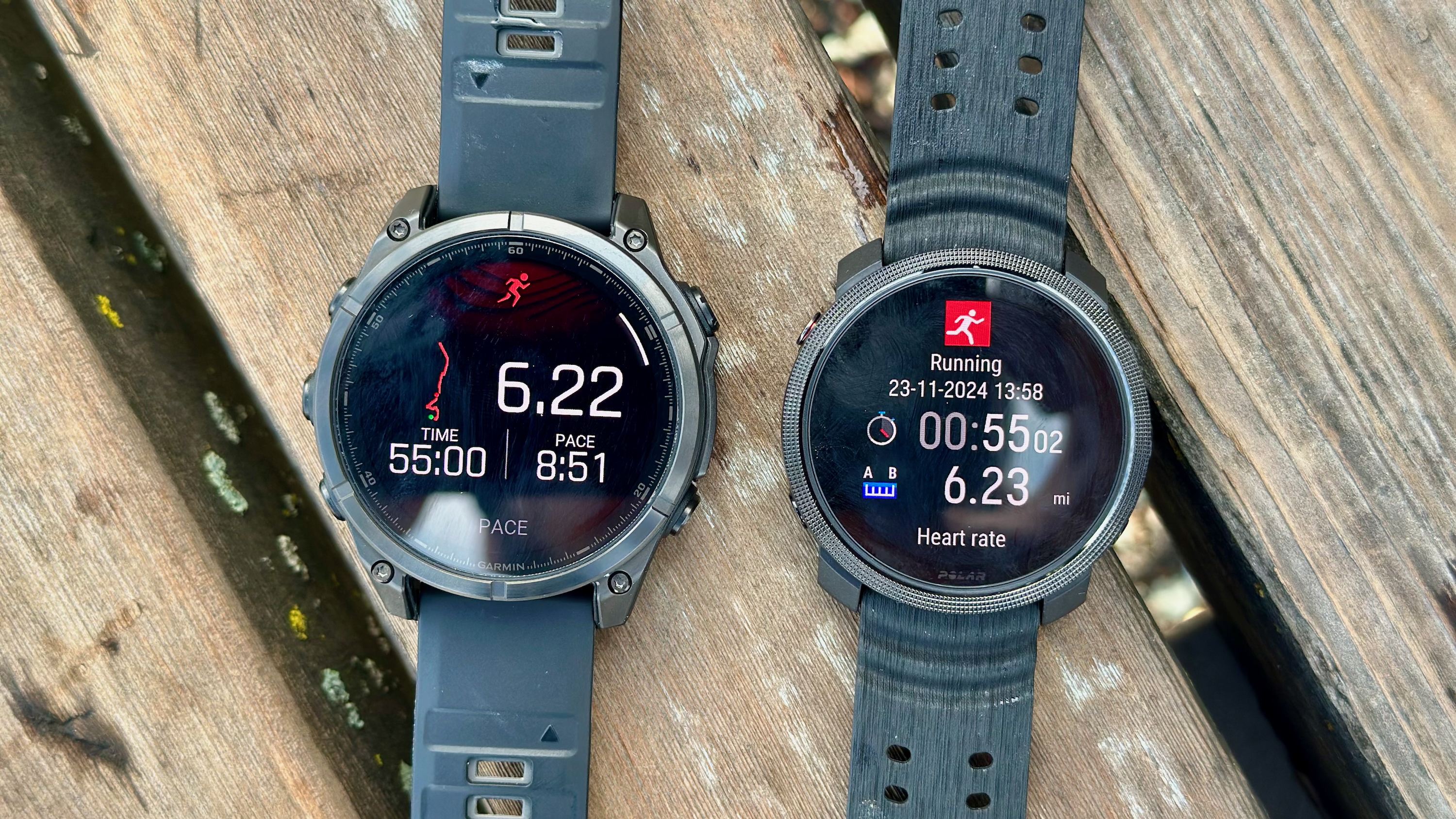 The Polar Vantage M3 and Garmin Fenix 8 showing similar run distance summaries