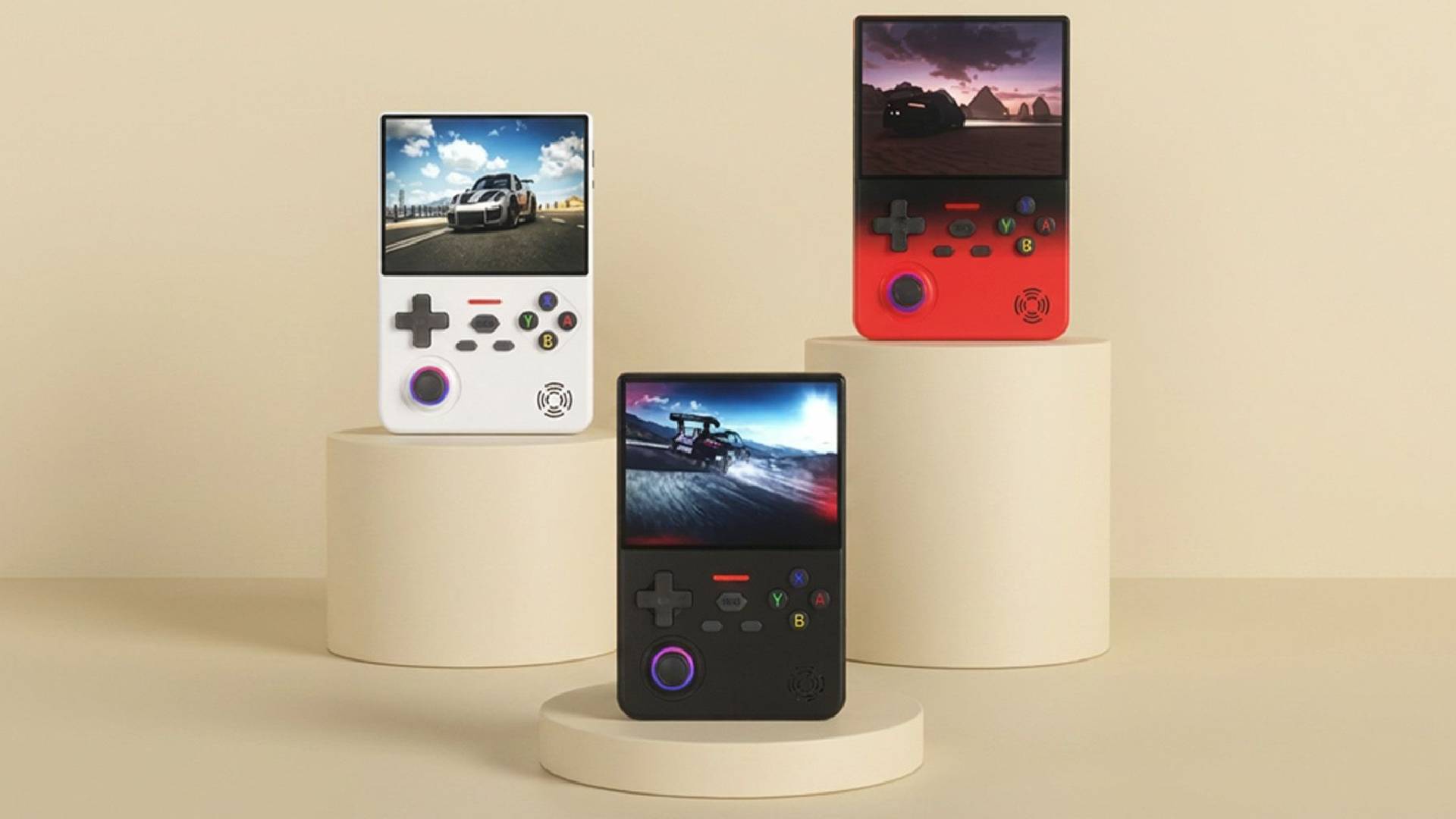 Three Lenovo G02 handhelds on pillars, with black in centre, red on top right, and white on middle left.