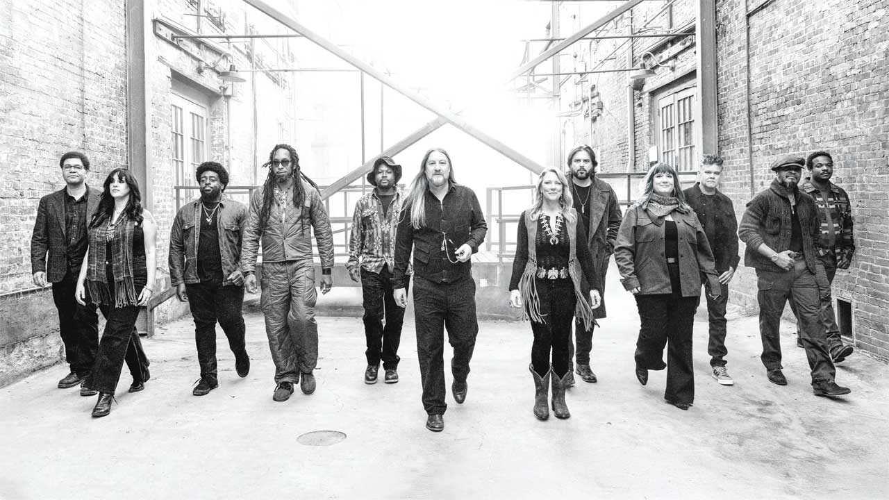 Tedeschi Trucks Band walking down an alleyway