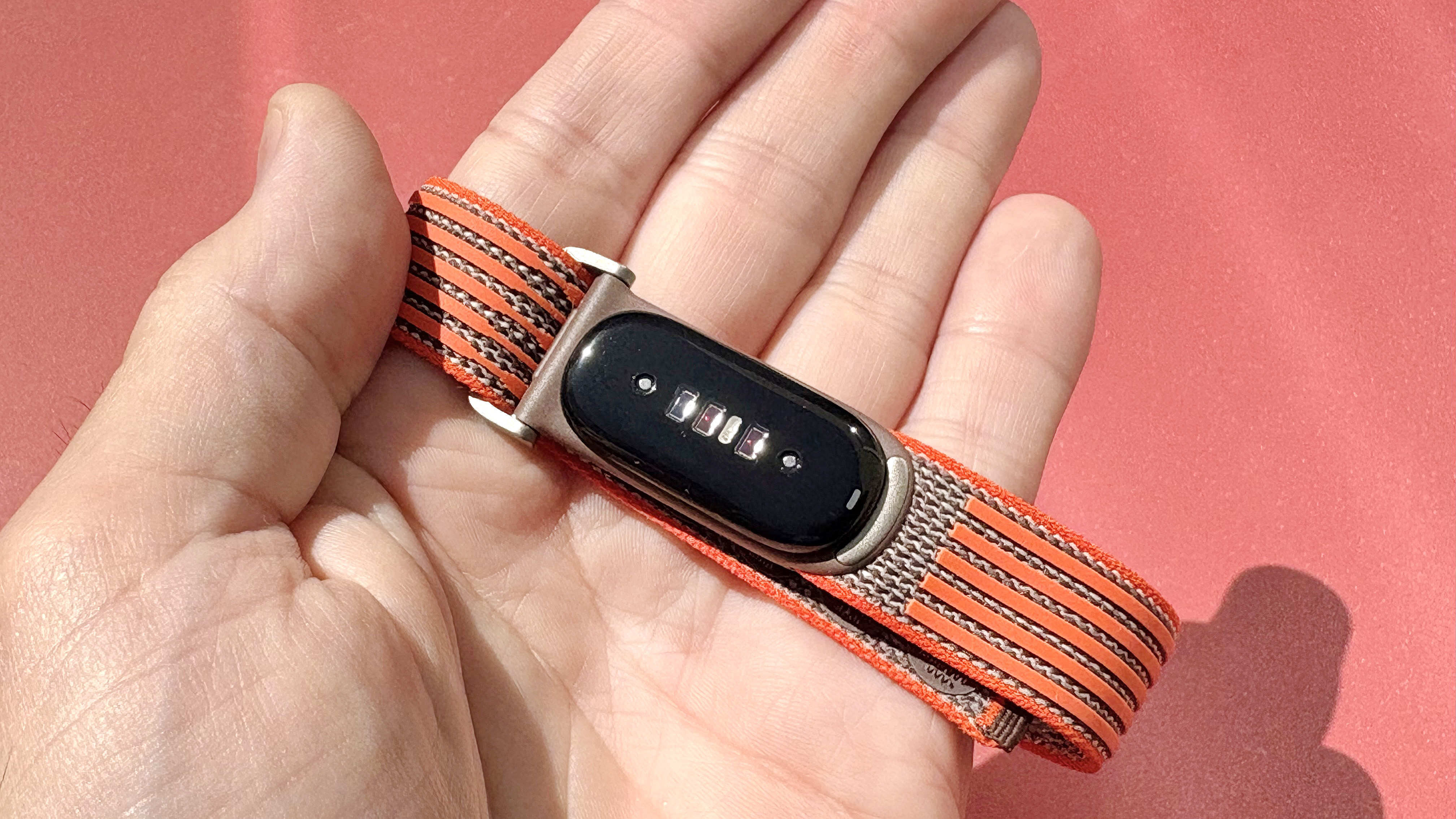 Hands-on with the Fitbit Air on the orange and brown Stephen Curry strap