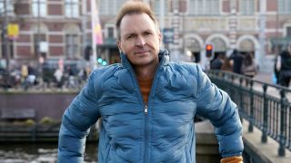Phil Keoghan posing in Europe