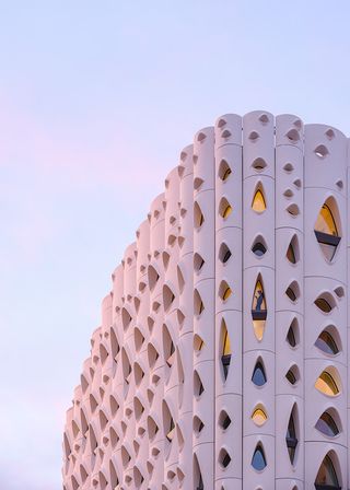 populus hotel with organic inspired facade and irregular openings