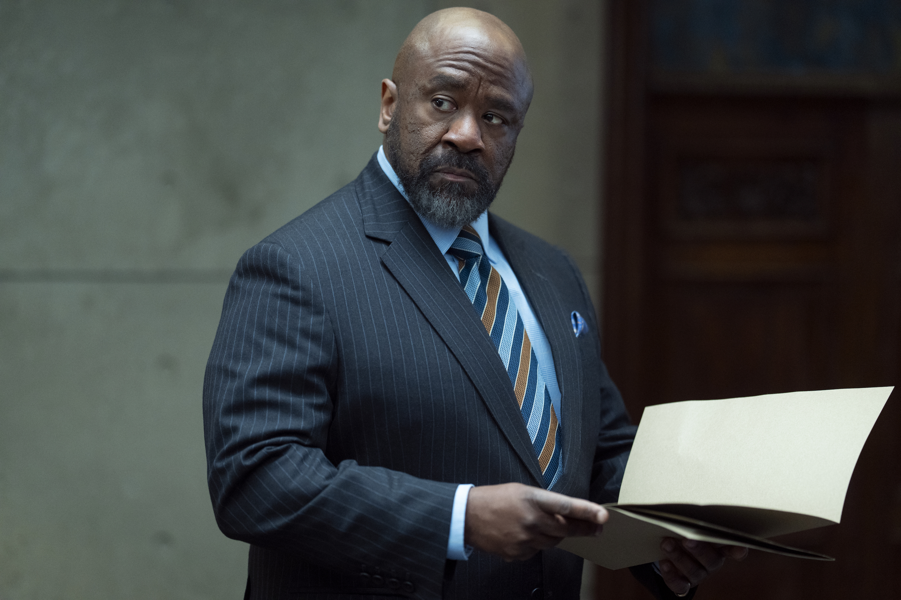 Lucian Msamati as Kofi Adomako.
