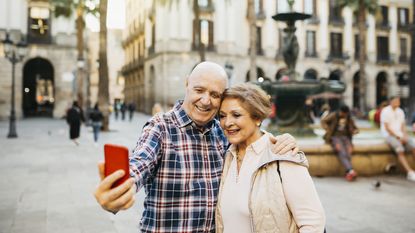 A senior couple travel in retirement.