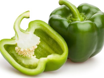 Whole And Sliced Green Peppers