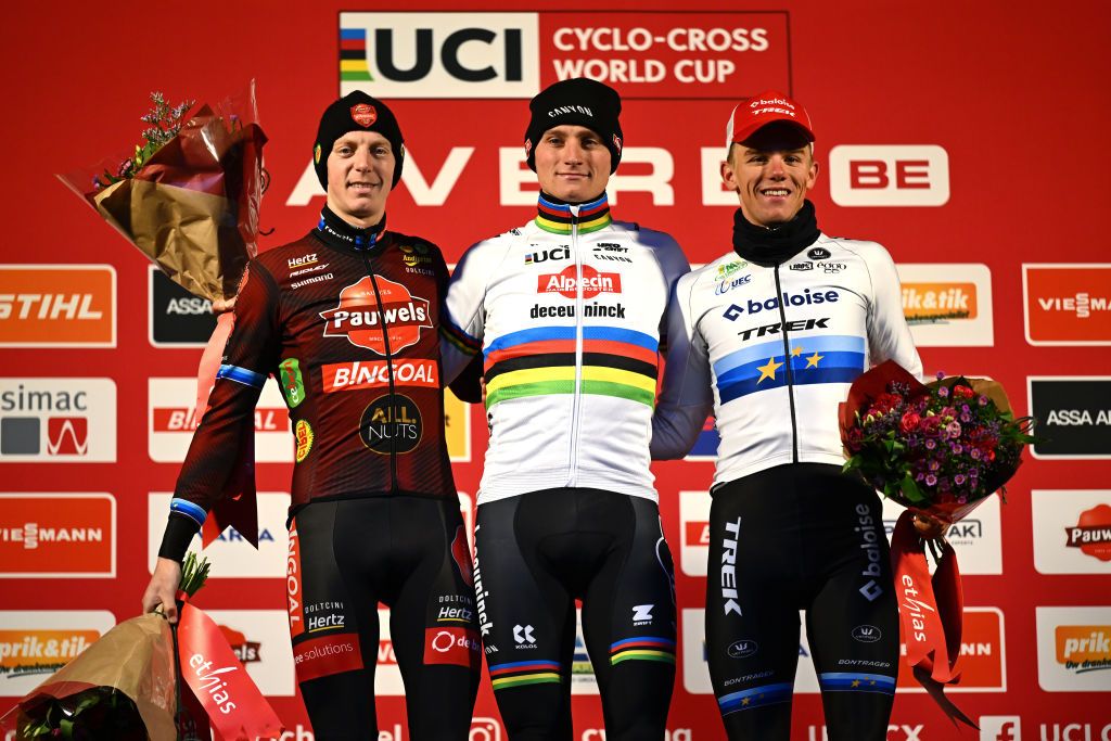 GAVERE BELGIUM DECEMBER 26 LR Michael Vanthourenhout of Belgium and Team Pauwels Sauzen Bingoal on second place race winner Mathieu Van Der Poel of The Netherlands and Team AlpecinDeceuninck and Thibau Nys of Belgium and Team Baloise Trek Lions on third place pose on the podium ceremony after the the 3rd UCI Cyclocross World Cup Gavere 2024 Mens Elite on December 26 2024 in Gavere Belgium Photo by Luc ClaessenGetty Images