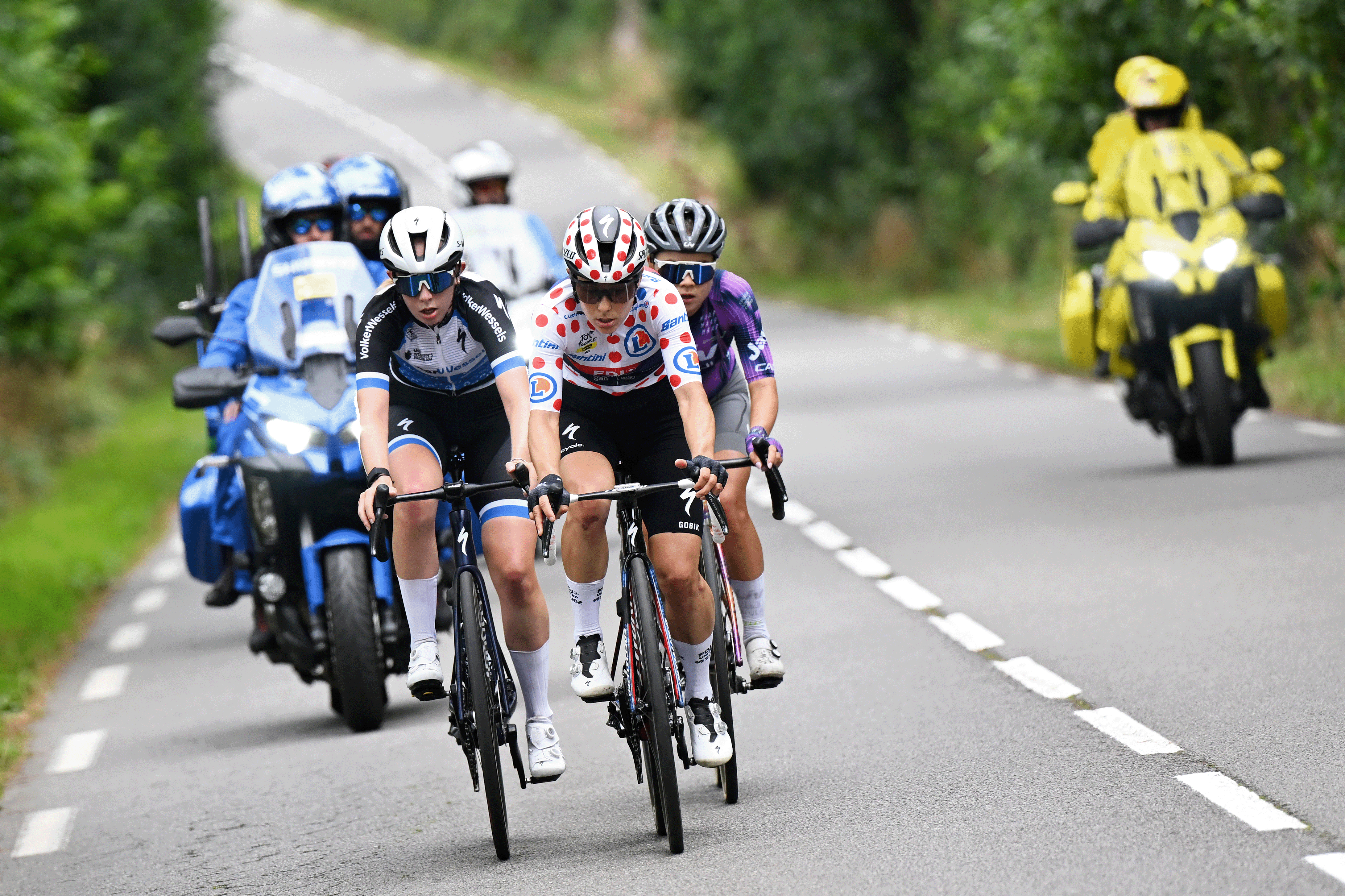 QUIMPER , FRANCE - JULY 27: (L-R) Maud Rijnbeek of Netherlands and Team VolkerWessels Cycling, Elise Chabbey of Switzerland and Team FDJ - SUEZ - Polka dot Mountain Jersey and Silke Smulders of Netherlands and Team Liv AlUla Jayco compete in the breakaway during the 4th Tour de France Femmes 2025, Stage 2 a 110.4km stage from Brest to Quimper / #UCIWWT / on July 27, 2025 in Quimper, France. (Photo by Szymon Gruchalski/Getty Images)