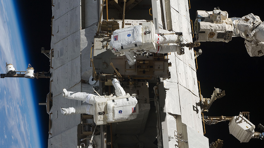 Richard Arnold and Joseph Acaba in 2009 spacewalk