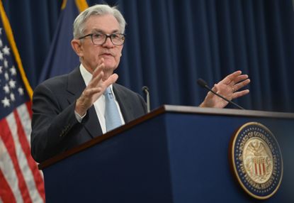 Jerome Powell speaks to the press