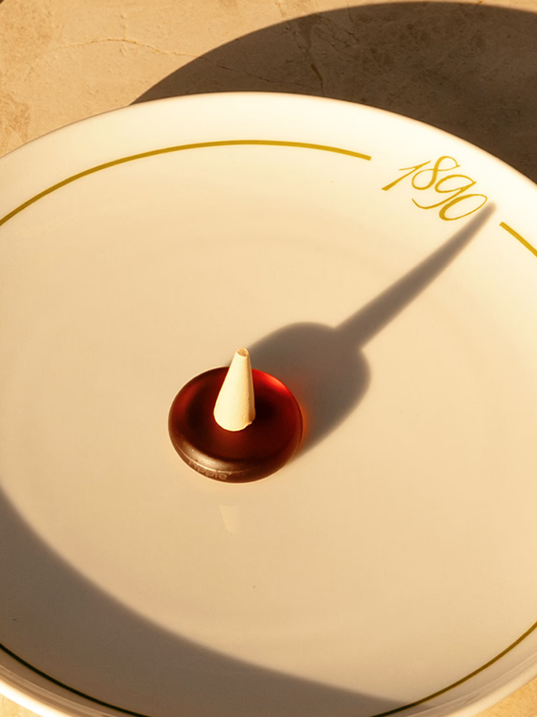 A palo santo incense cone from DROPLET