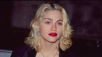madonna on a black background in the '90s