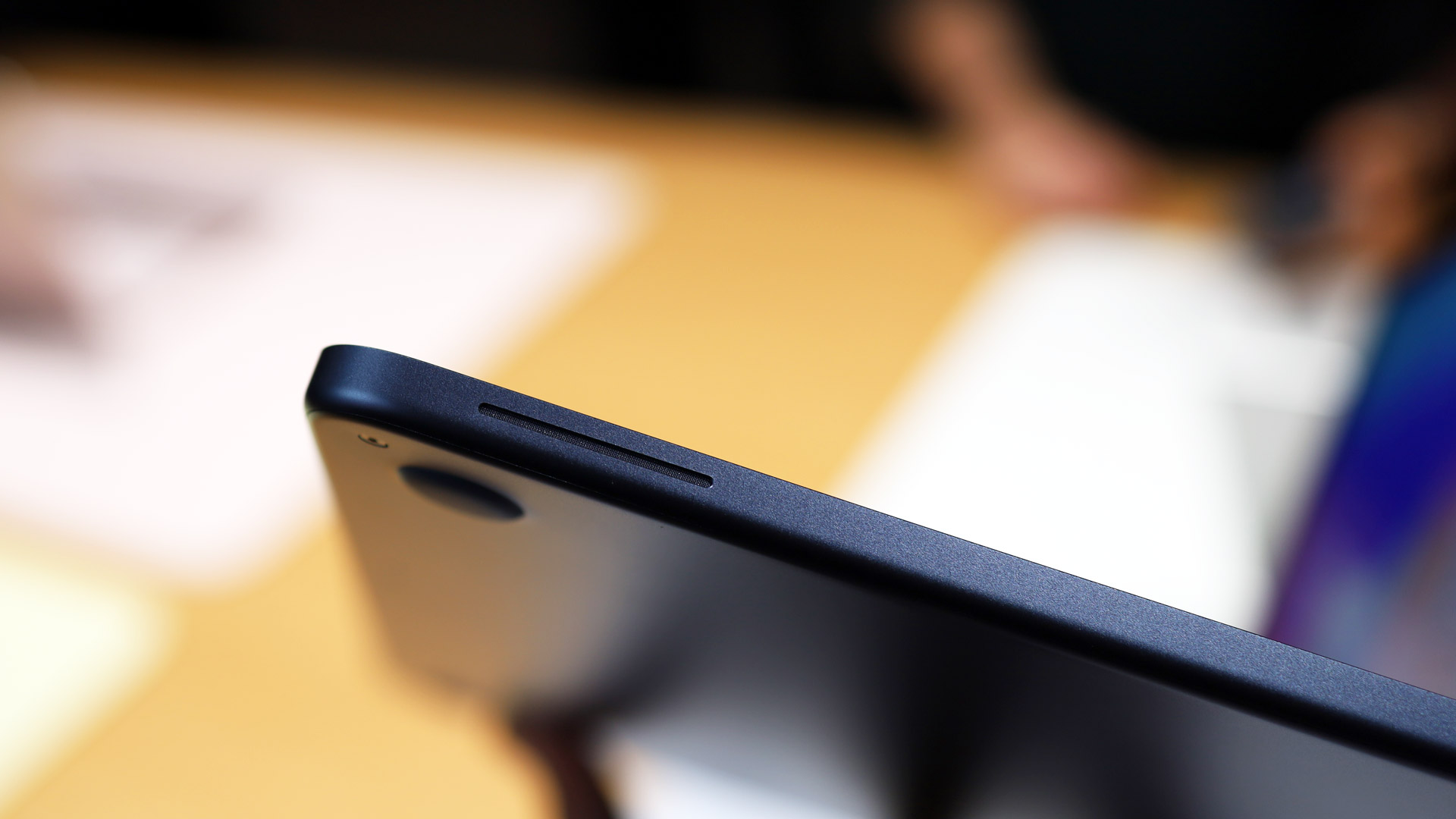 The side of the MacBook Neo laptop showing its speaker