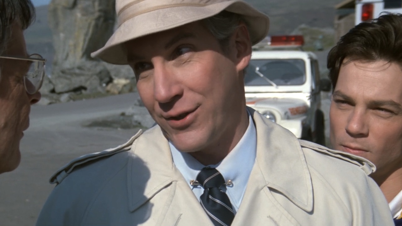 Mr. Perkins looking smug in a hat in The Goonies