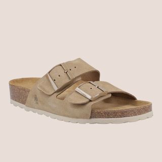 flat lay image of beige sandals 