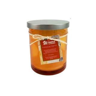 An orange candle jar
