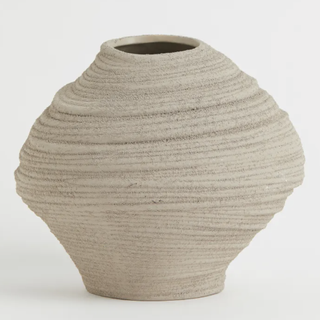 organic shaped neutral colored vase 