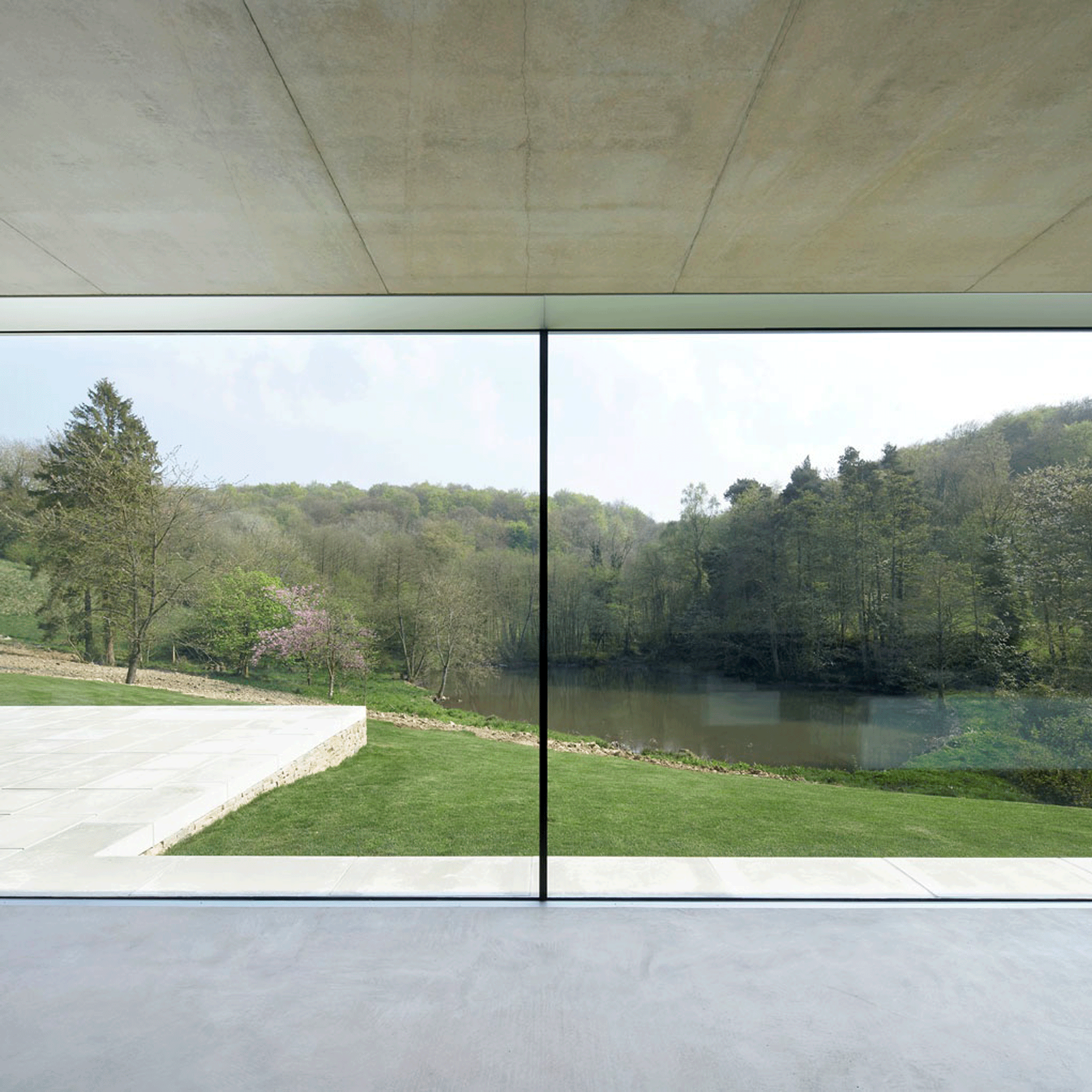 large glass window with view out to the countryside
