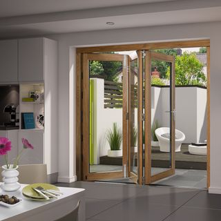 wooden frame door on white wall and grey flooring