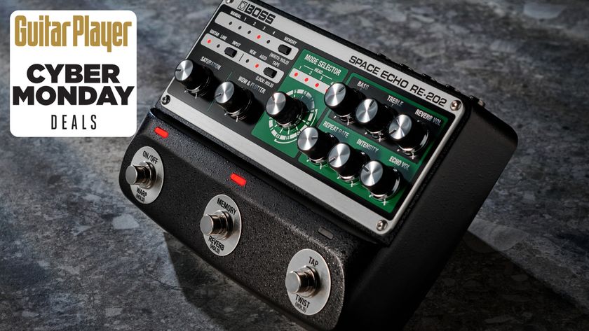 A Boss RE-202 Space Echo guitar pedal on a concrete floor