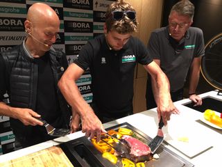 Peter Sagan cooks a steak at the Bora-Hansgrohe press conference