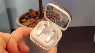 The Samsung Galaxy Buds 4 Pro in their carry case.