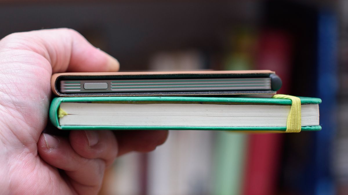 reMarkable Paper Pro Move tablet in front of a library of books, showing various writing screens and comparing the size to a Moleskine notebook