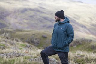 Bearded man wearing Patagonia Torrentshell jacket