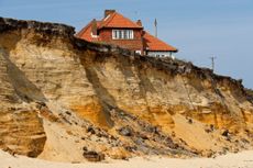 Living on the edge: Eastern Bavents, Southwold, Suffolk. Credit: Alamy Stock Photo