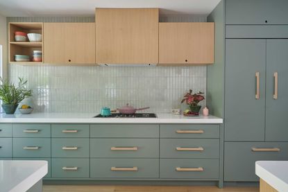 a kitchen with textured field tiles