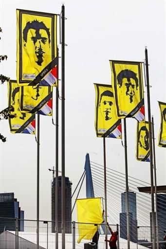 Flags bore the likeness of each rider in the 2010 Tour de France.