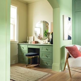 Green dressing table with built in cupboards